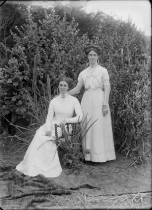 Two women, unidentified, in a garden, possibly Christchurch district