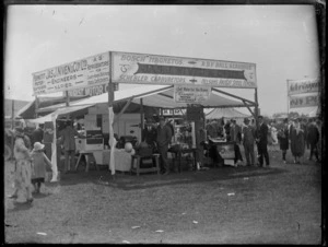 Farming field day booth of Jas J Niven & Co Ltd of Napier, showing their agricultural equipment and domestic appliances, Hawke's Bay District