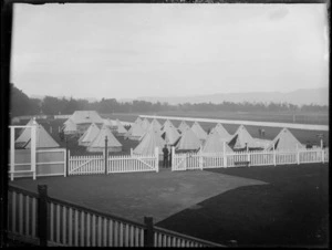 New Zealand Military Forces, showings tents pitched in the field and unidentified men standing around, Hastings