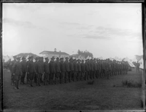 A group of unidentified soldiers standing on parade, at casual camp, Hastings