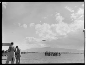 RNZAC Pageant, Dunedin, showing Otago Air Training Corps band with Royal Air Force Lincoln Mercury aeroplane flying overhead