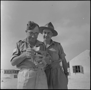Sergeants Abel and McGinn receive Patriotic Fund Board parcels at Maadi, World War II