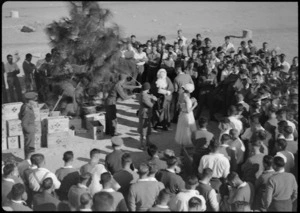 Crowd of patients around Christmas tree at 2 NZ General Hospital, Egypt - Photograph taken by W Timmins