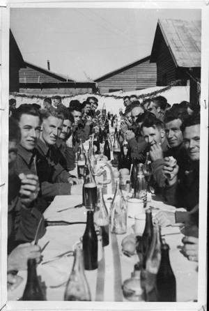 Christmas dinner in the open at NZ Base Reception Unit Maadi Camp, World War II - Photograph taken by H G Witters