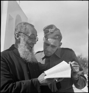 Roman Catholic priest with NZ soldier at Giovanni Berta, Libya, World War II
