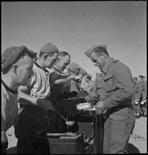Serving out Christmas dinner at Sirte, Libya, World War II