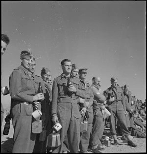NZ troops during the GOC's visit and toast at Sirte, Libya, World War II
