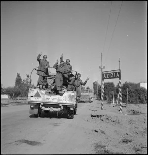 NZers in convoy pass through Azizia, Libya - Photograph taken by H Paton