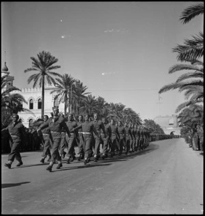 Men of the NZ Division approaching the saluting base at a parade in Plaza Castello, Tripoli, World War II - Photograph taken by H Paton