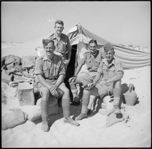 Group of New Zealanders outside their bivvy in the Western Desert, Egypt