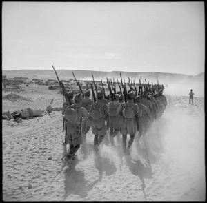 NZ troops marching at review on the eve of the Libyan battle