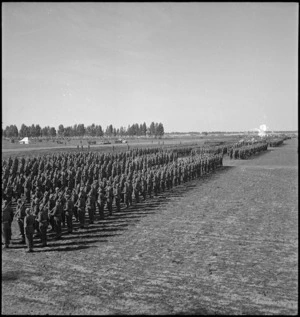 Panoramic view of NZ Divisional parade for Prime Minister of Great Britain in Tripoli, World War II - Photograph taken by H Paton
