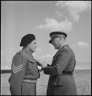 Sergeant W J Kennedy presented with Military Medal by General Freyberg at Maadi, World War II - Photograph taken by M D Elias