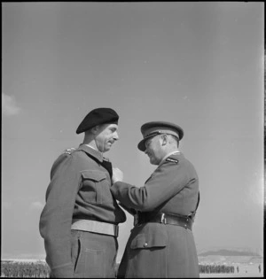 Colonel S F Hartnell receives the DSO from General Freyberg at Maadi, World War II - Photograph taken by M D Elias
