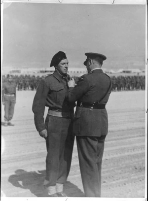 Lieutenant Colonel J T Burrows receiving DSO from General Freyberg at Maadi, World War II - Photograph taken by Captain Abbot