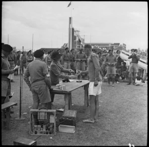 Lady Freyberg presenting prizes at 4th Armoured Briagde Sports Meeting held at Farouk Stadium, Cairo - Photograph taken by G R Bull