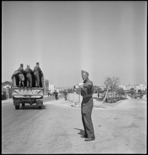 MP directing the traffic through Sousse, Tunisia, in World War II - Photograph taken by H Paton