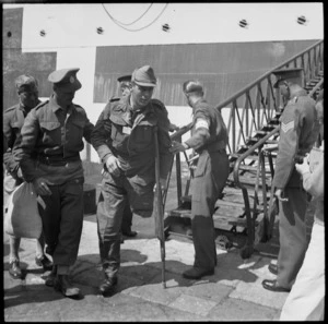 New Zealander who had lost a leg comes ashore at Alexandria, World War II - Photograph taken by G R Bull