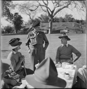 NZ and Australian soldiers talking with General Montgomery at a garden party in Cairo for personnel repatriated from Italy - Photograph taken by S Wymess