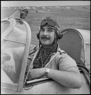 Flying Officer P N McGregor in the cockpit of his Hurricane, Tunisia, World War II - Photograph taken by M D Elias