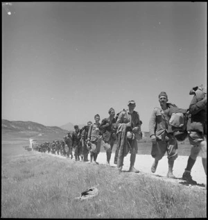 A line of Italian prisoners after the Axis collapse in Tunisia - Photograph taken by M D Elias