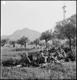 German prisoners resting on the grass after the Axis collapse in Tunisia - Photograph taken by M D Elias