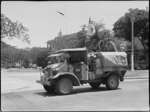 Transport of the New Zealand Division passing through Maadi, Egypt, at the end of North African campaign, World War II - Photograph taken by H Paton