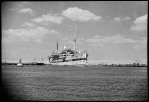 Hospital ship passes through open bridge on Suez Canal, World War II - Photograph taken by G Kaye