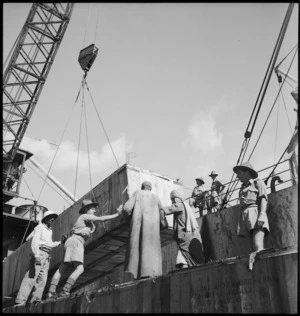Members of NZ Port Detachment supervising unloading of cargo at Port Tewfik, World War II - Photograph taken by G Kaye