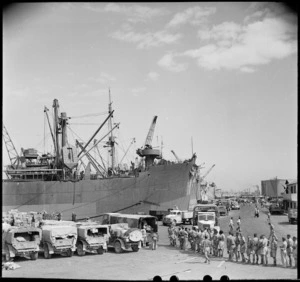 Drivers of NZ advance party trucks lining up for lunch on Alexandria wharf, World War II - Photograph taken by M D Elias