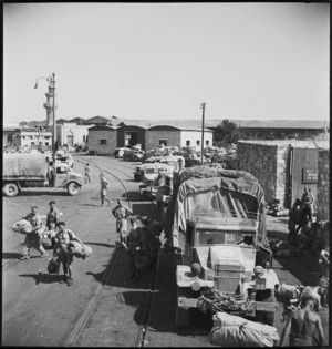 Trucks of advance party arrive at Alexandria wharf for embarkation, World War II - Photograph taken by M D Elias