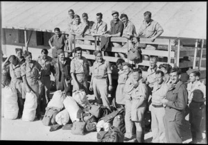 Repatriated New Zealand prisoners of war unload belongings at Maadi Camp, Egypt - Photograph taken by George Robert Bull