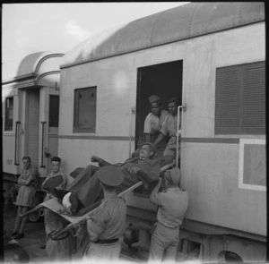 Indian stretcher case taken aboard hospital train at Alexandria - Photograph taken by George Robert Bull