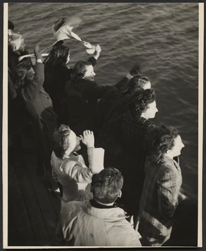 Group on the ferry Cobar, Wellington, waving goodbye to World War II troops