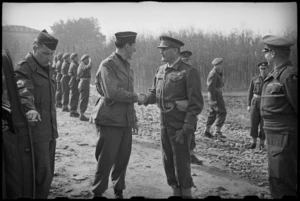 Lieutenant General Sir Bernard Freyberg shakes hands with General Mark Clark at NZ Division HQ in Italy - Photograph taken by J Short