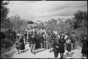 NZ tanks driving northwards near Padova are warmly greeted by country people - Photograph taken by George Kaye