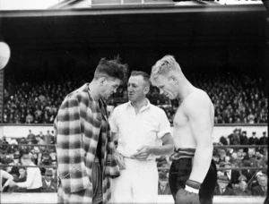 Referee explaining the rules before a boxing match between Maurice Strickland and a boxer named Mr Mullett