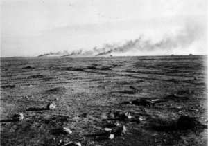 Sidi Azeiz, Libya, with smoke from attacked World War II New Zealand trucks in background