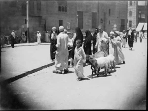 Street scene in Cairo showing local people and goats - Photograph taken by George Kaye