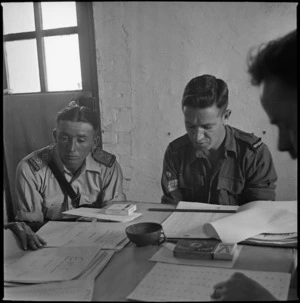 Making up the list of men eligable for the Ruapehu draft of the NZ Leave Scheme, Maadi, Cairo, Egypt - Photograph taken by Harold Gear Paton