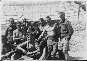 New Zealand gun crew after action at Medinine, Tunisia - Photograph taken by Sergeant H R Joll