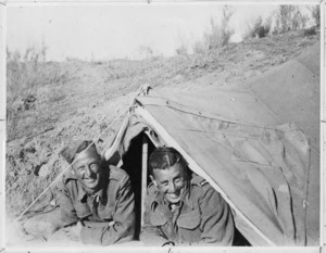 Off duty New Zealand soldiers from 4th Field Regiment in a bivouac, Tripolitania, Libya - Photograph taken by Sergeant H R Joll