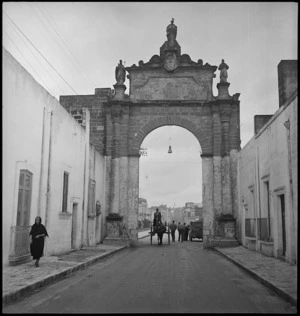 Archway at the entrance to Manduria, Italy, erected by Charles V, Holy Roman Emperor - Photograph taken by George Kaye