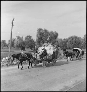 Italian refugees travelling with loaded carts near Taranto, Italy, World War II - Photograph taken by George Kaye
