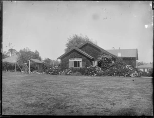 The property of the Lowry family, a vine covered house, Havelock North, Hawkes Bay District