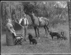 [Mr & Mrs Bradshaw] with dogs and horse