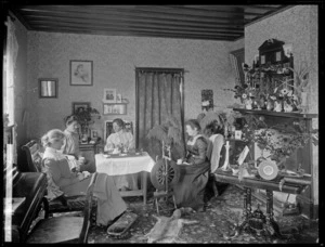 Living room of the Simpson house, with women drinking tea