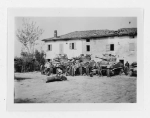 New Zealand tank crews, Italy, cleaning up after an advance - Photograph taken by W K Lloyd