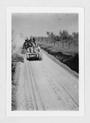 New Zealand tank racing to catch up with forward troops, Italy - Photograph taken by W K Lloyd.
