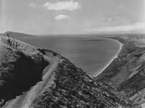 Creator unknown :Photograph of a view including the Paekakariki Hill Road and the Paekakariki coastline below, Kapiti Coast, Wellington region